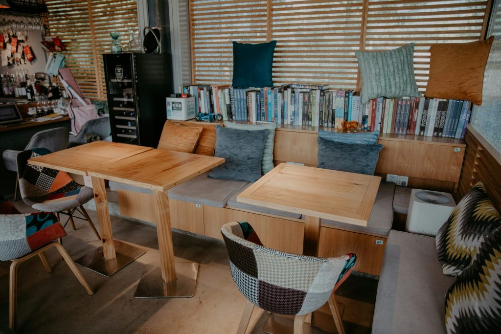 brown wooden table with chairs